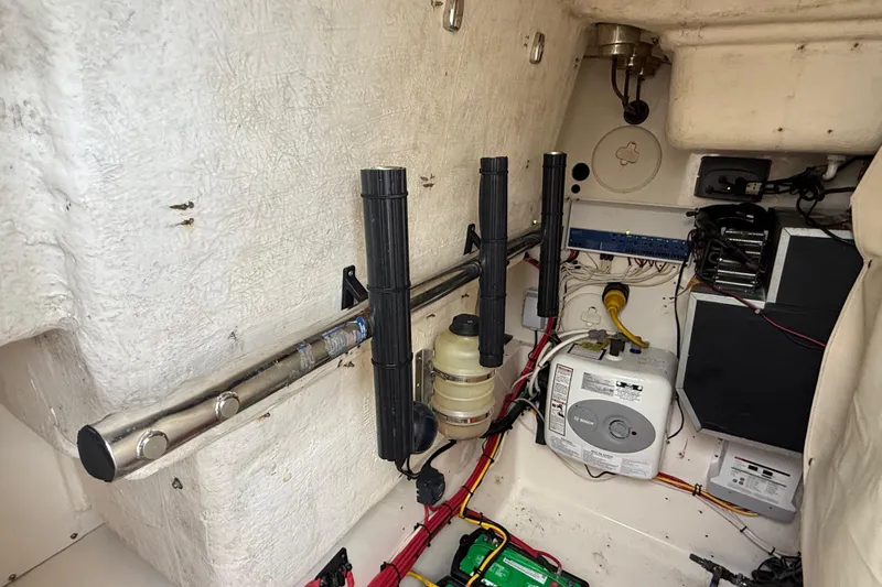  Yacht Photos Pics 2010 Triton 351 Express boat interior showing electrical and mechanical components.