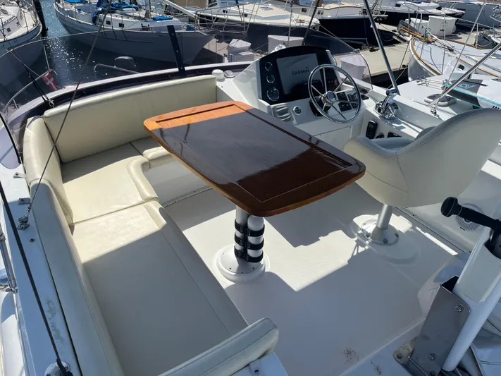 Eleven Seven Yacht Photos Pics Flybridge of 2013 Beneteau Swift Trawler 34 with seating and helm station.