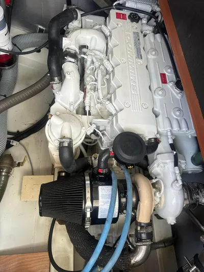 Eleven Seven Yacht Photos Pics Engine compartment of 2013 Beneteau Swift Trawler 34, featuring a Cummins marine engine.