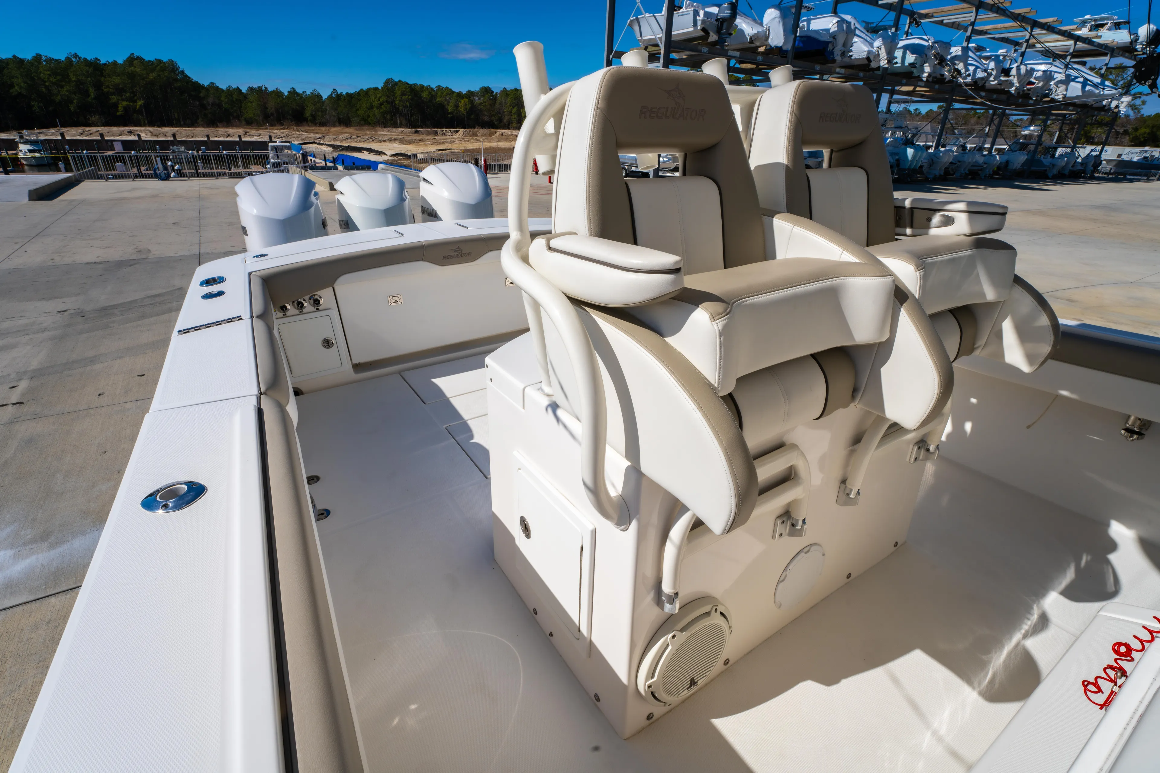  Yacht Photos Pics 2019 Regulator 34 boat with dual helm seats and spacious deck.