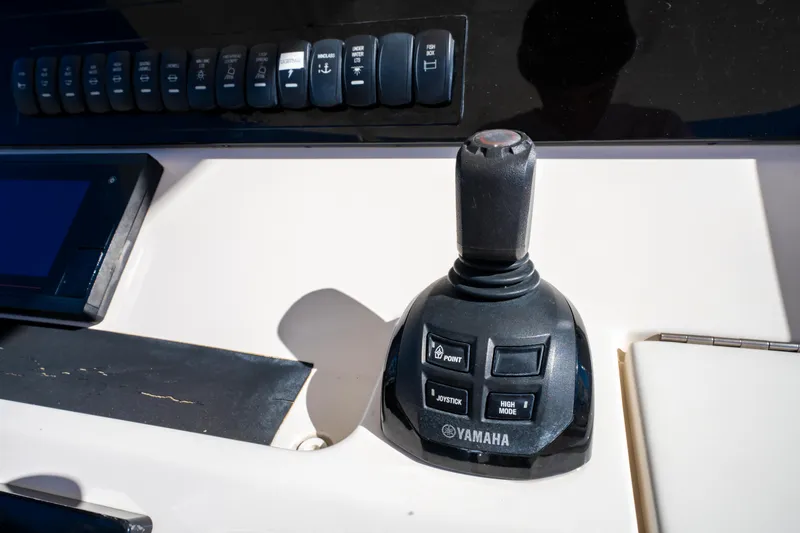  Yacht Photos Pics Joystick control on 2019 Regulator 34 boat dashboard, featuring Yamaha branding.