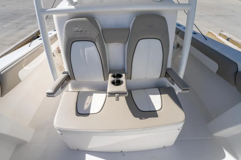  Yacht Photos Pics 2019 Regulator 34 boat seating with dual chairs and cup holders.