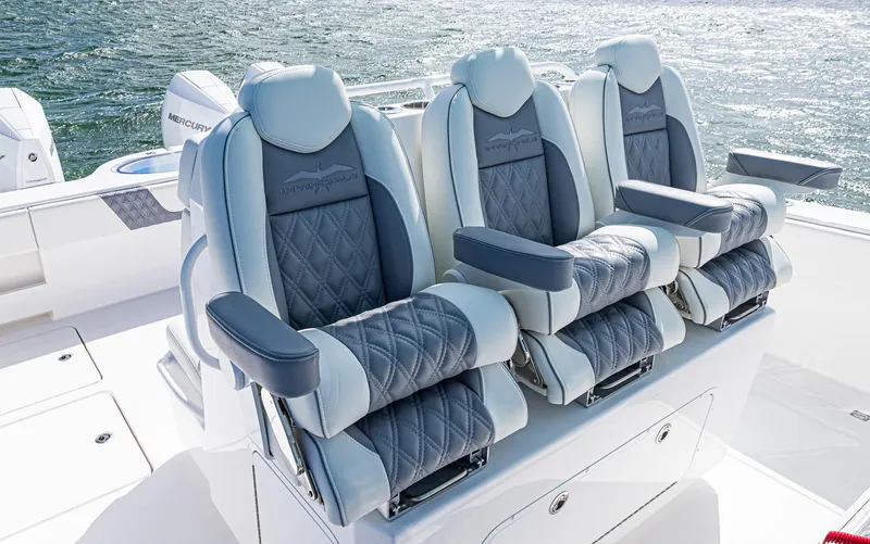  Yacht Photos Pics Luxurious seating on 2025 Invincible 35 Catamaran, featuring plush, ergonomic design.