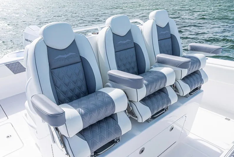  Yacht Photos Pics Luxury seating on 2025 Invincible 35 Catamaran, featuring elegant design and comfort.