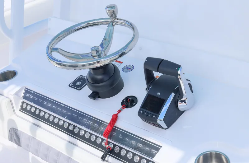  Yacht Photos Pics 2025 Invincible 35 Catamaran helm with steering wheel and controls.