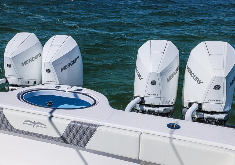  Yacht Photos Pics 2025 Invincible 35 Catamaran with four Mercury outboard engines on the ocean.
