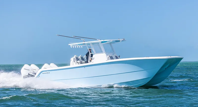  Yacht Photos Pics 2025 Invincible 35 Catamaran cruising on open water.