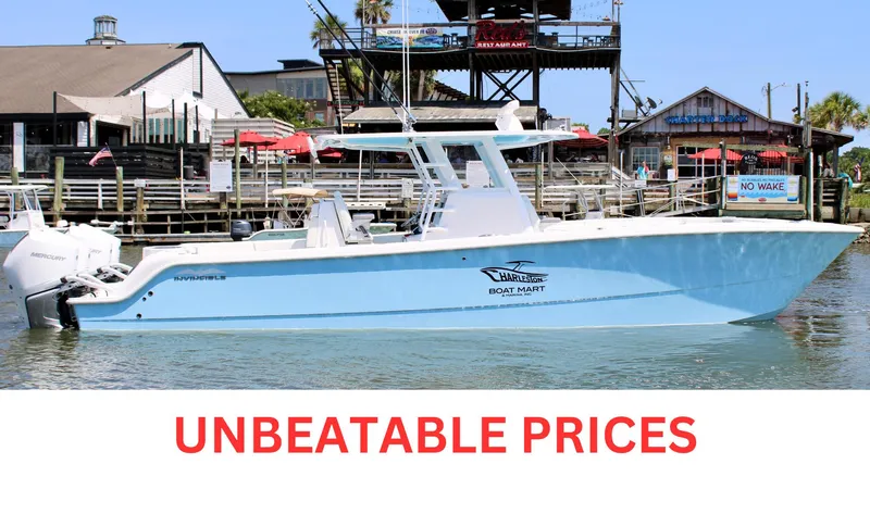  Yacht Photos Pics 2025 Invincible 35 Catamaran docked, showcasing sleek design and unbeatable prices.