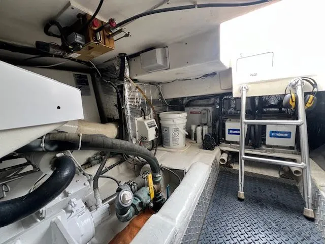Fryedays Off Yacht Photos Pics Engine room of 2003 Ocean Yachts 43 Super Sport, showcasing equipment and maintenance tools.