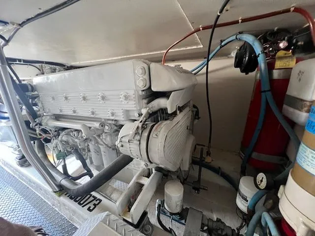 Fryedays Off Yacht Photos Pics Engine room of 2003 Ocean Yachts 43 Super Sport, showcasing detailed machinery and components.