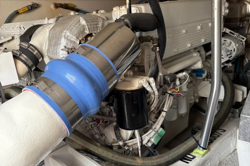 Fryedays Off Yacht Photos Pics Engine compartment of a 2003 Ocean Yachts 43 Super Sport boat, showcasing detailed components.