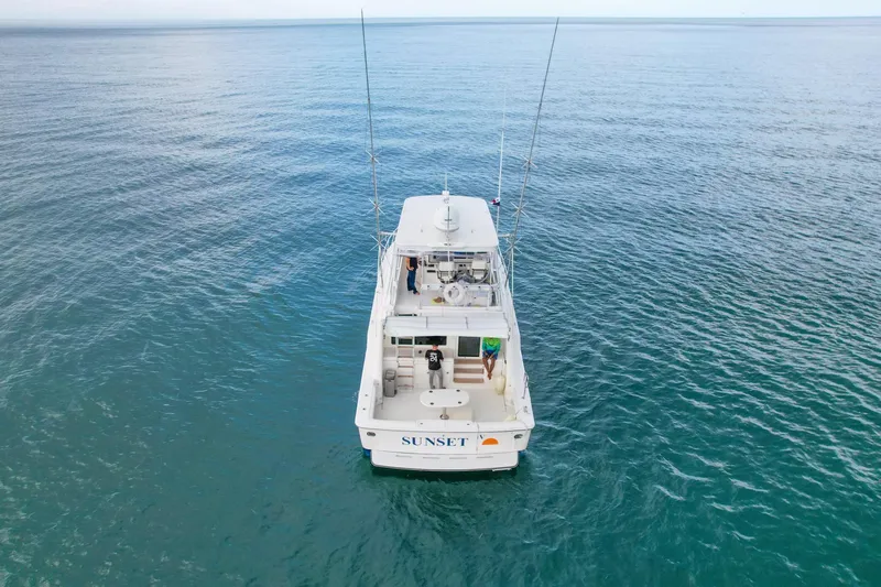  Yacht Photos Pics 2007 Bertram 510 Convertible yacht on open sea, aerial view.