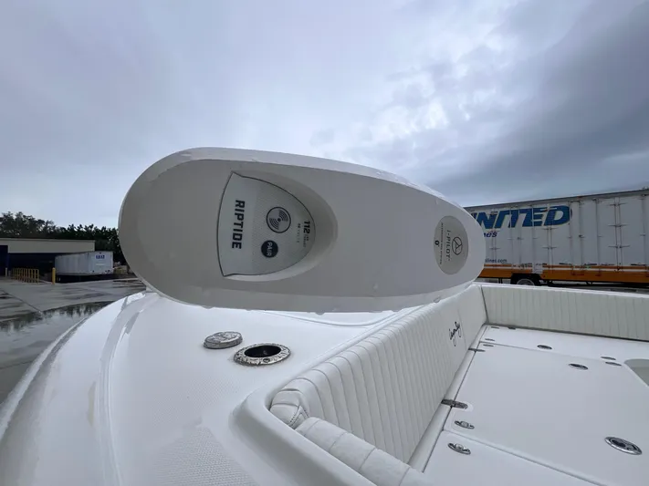  Yacht Photos Pics Canyon Bay 28h boat, 2022 model, featuring Riptide trolling motor on deck.