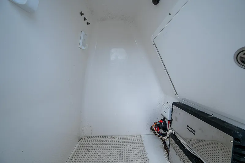  Yacht Photos Pics Interior cabin of 2022 Canyon Bay 28h boat, featuring storage and wiring.