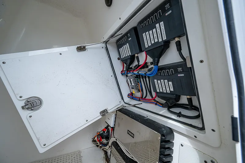  Yacht Photos Pics Canyon Bay 28h 2022 boat electrical panel with open access door.
