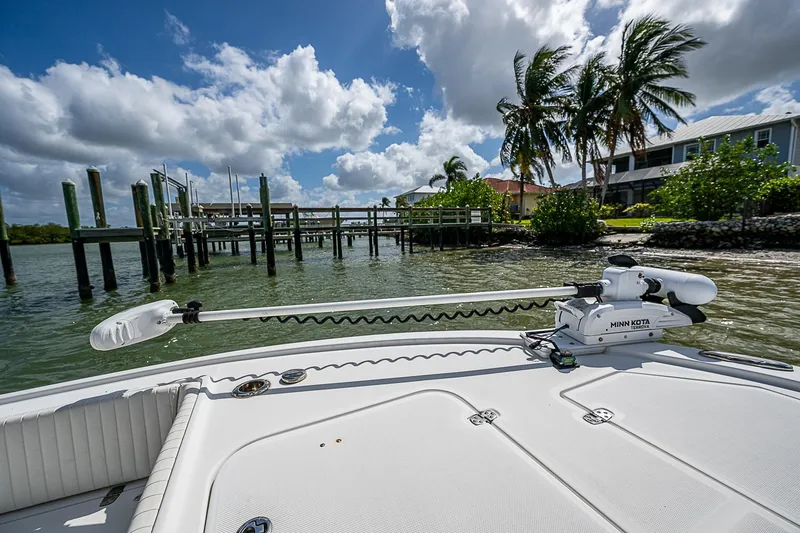  Yacht Photos Pics Canyon Bay 28h boat near dock, tropical setting, 2022 model.