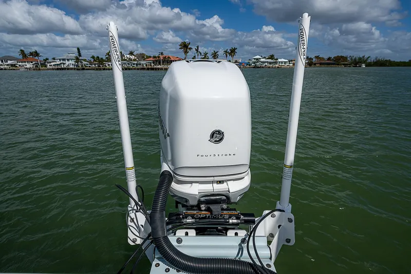  Yacht Photos Pics Canyon Bay 28h 2022 boat engine on water with scenic background.