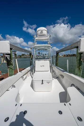  Yacht Photos Pics 2022 Canyon Bay 28h boat docked under clear blue sky.