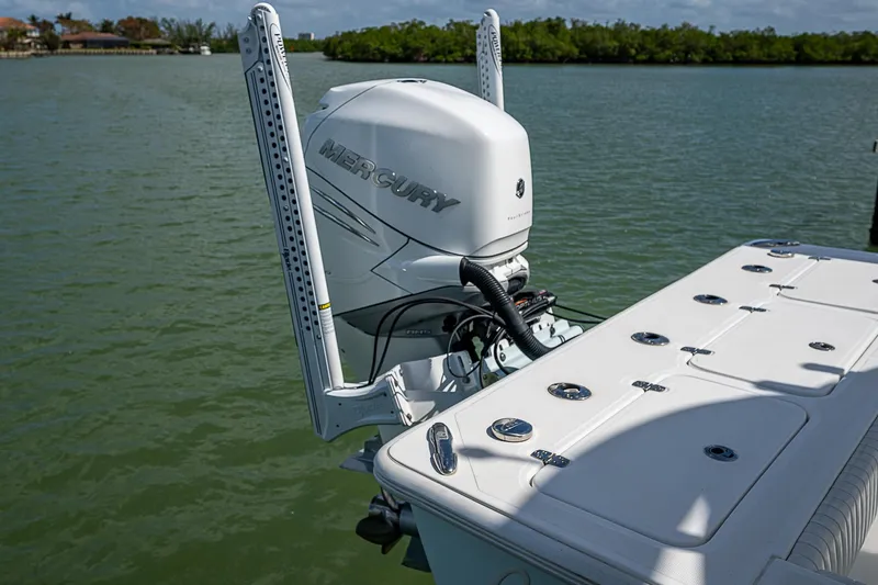  Yacht Photos Pics 2022 Canyon Bay 28h boat with Mercury outboard motor on calm water.