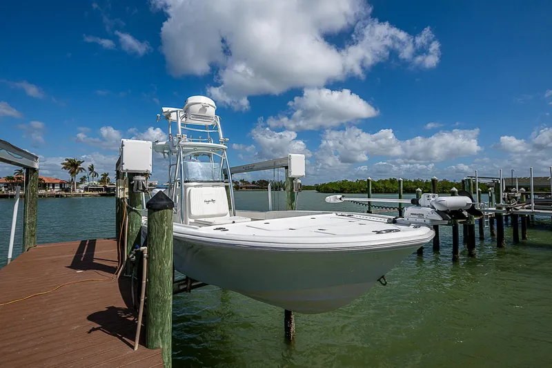  Yacht Photos Pics Canyon Bay 28h 2022 boat docked on a sunny day with blue skies.