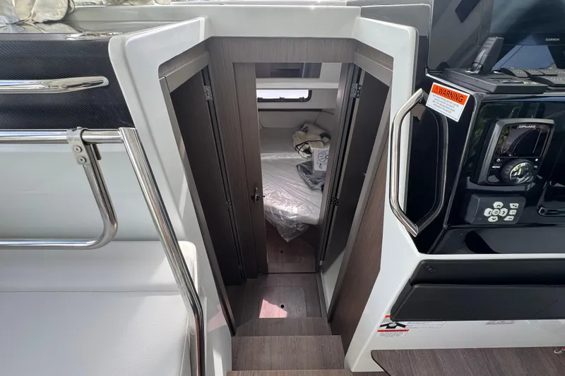  Yacht Photos Pics 2026 Jeanneau NC 895 Series 2 cabin interior with modern design and navigation controls.