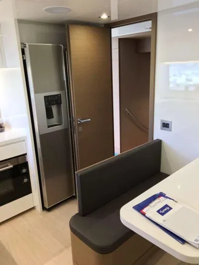  Yacht Photos Pics Modern kitchen interior of 2017 Custom Line Navetta 28 yacht with sleek appliances.