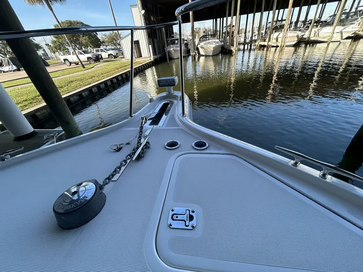 Native Dancer Yacht Photos Pics Tiara Yachts 3800 Open 2002 bow view at marina dock.