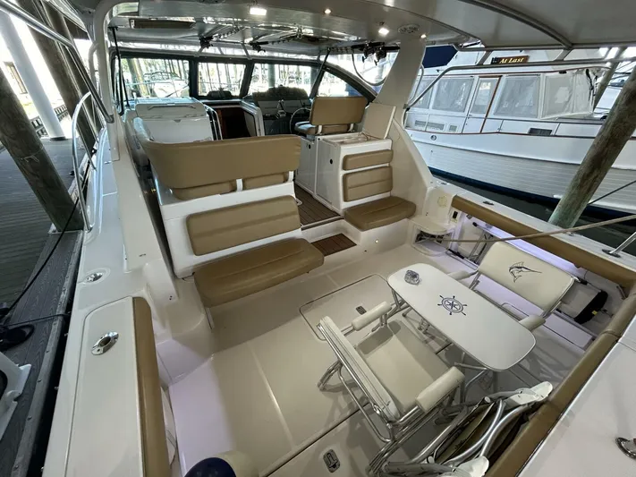 Native Dancer Yacht Photos Pics Interior of 2002 Tiara Yachts 3800 Open, featuring spacious seating and modern design.