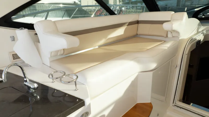  Yacht Photos Pics Luxurious interior seating of 2014 Sea Ray 410 Sundancer yacht with sleek design and modern amenities.