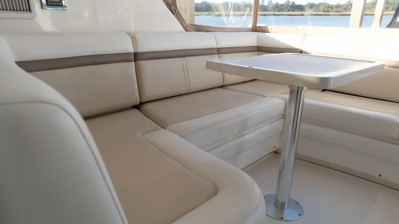  Yacht Photos Pics Luxurious seating area on 2014 Sea Ray 410 Sundancer yacht with elegant table.