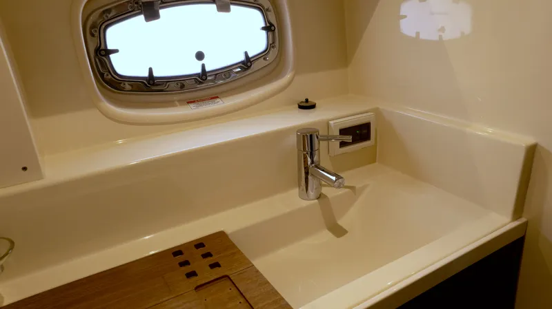  Yacht Photos Pics Luxurious bathroom sink in 2014 Sea Ray 410 Sundancer yacht.