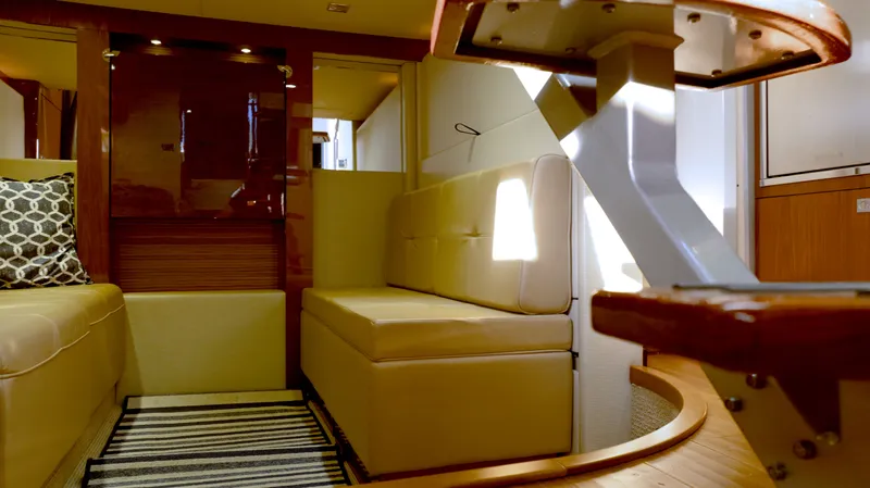  Yacht Photos Pics Interior of 2014 Sea Ray 410 Sundancer yacht with beige seating and modern decor.