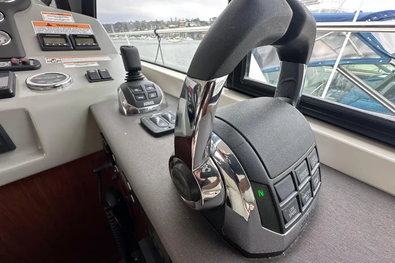 Sweet Yacht Photos Pics Control panel of 2017 Bavaria Virtess 420 Fly yacht with throttle and joystick.