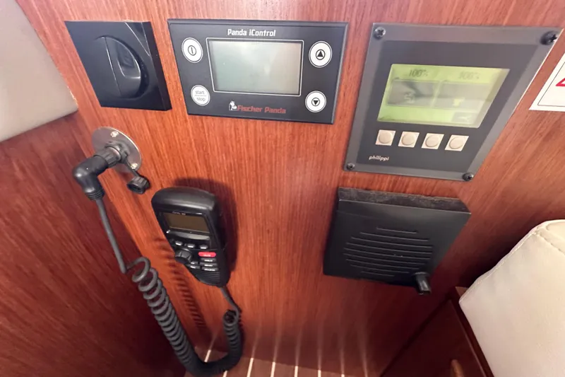 Sweet Yacht Photos Pics Control panel on 2017 Bavaria Virtess 420 Fly yacht with communication equipment.
