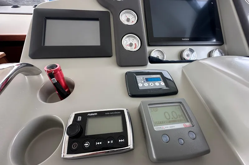 Sweet Yacht Photos Pics Control panel of 2017 Bavaria Virtess 420 Fly yacht with navigation and monitoring systems.