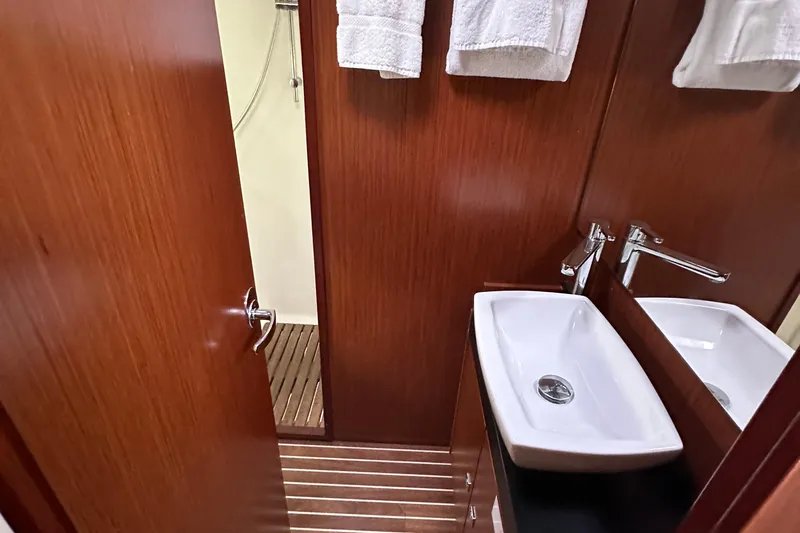 Sweet Yacht Photos Pics Luxurious bathroom interior of 2017 Bavaria Virtess 420 Fly yacht with wooden finish.