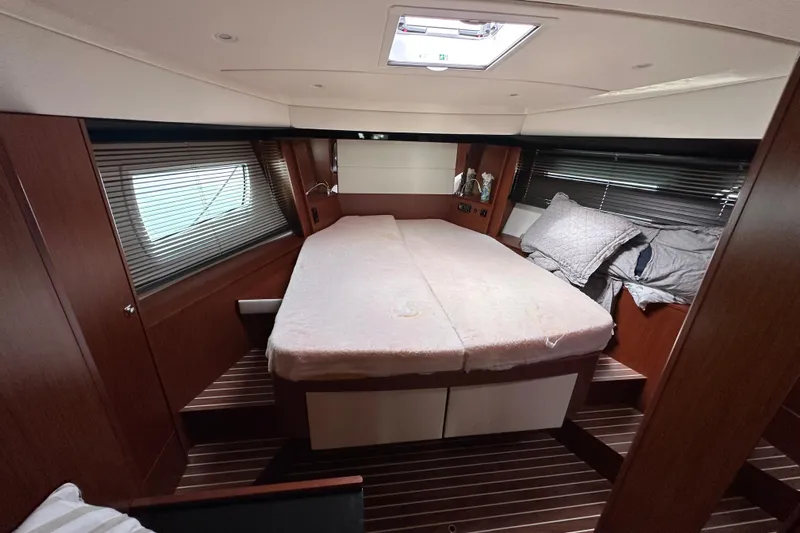 Sweet Yacht Photos Pics Luxurious cabin interior of 2017 Bavaria Virtess 420 Fly yacht with cozy bedding.