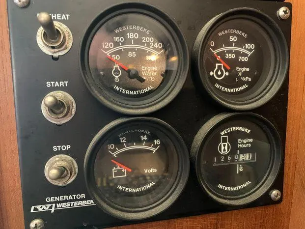 Magna Veritas Yacht Photos Pics Control panel of a 1996 Bayliner 4788 with Westerbeke generator gauges.