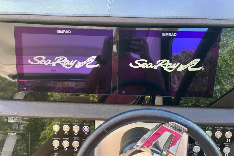 Blu Yacht Photos Pics Dashboard of 2020 Sea Ray Sundancer 320 Outboard with dual Simrad displays.