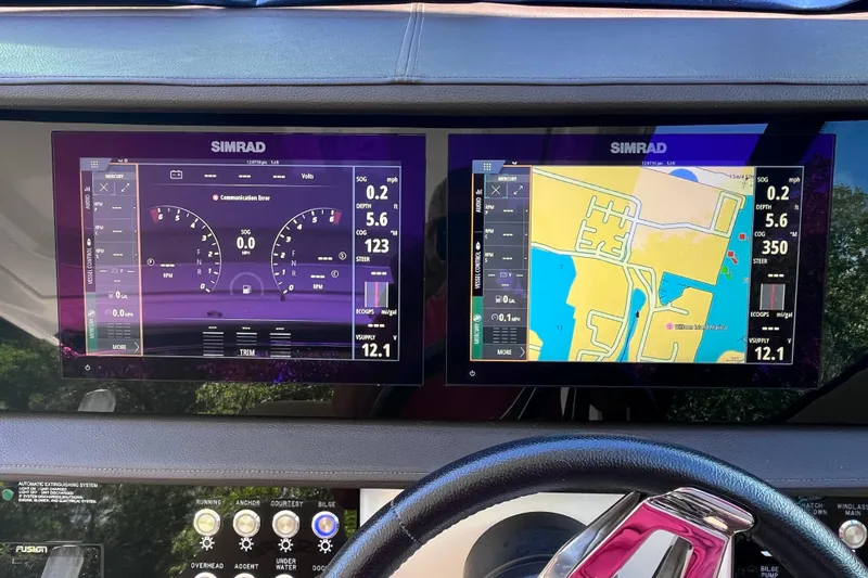 Blu Yacht Photos Pics Dashboard of 2020 Sea Ray Sundancer 320 Outboard with Simrad navigation displays.