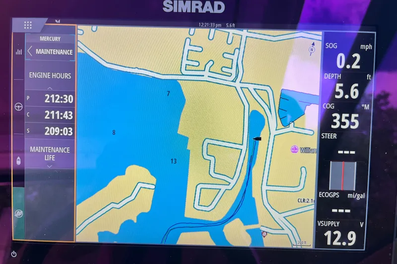 Blu Yacht Photos Pics Simrad navigation display on 2020 Sea Ray Sundancer 320 Outboard, showing map and engine data.