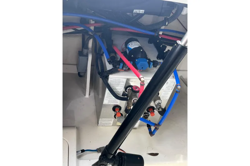 Blu Yacht Photos Pics 2020 Sea Ray Sundancer 320 Outboard engine compartment with wiring and components.