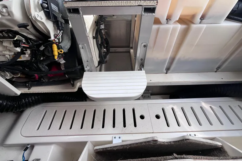 Blu Yacht Photos Pics Engine compartment of a 2020 Sea Ray Sundancer 320 Outboard boat, showing mechanical components.