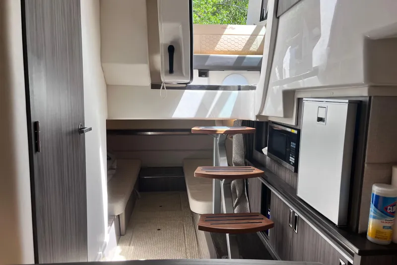 Blu Yacht Photos Pics Interior of 2020 Sea Ray Sundancer 320 Outboard, featuring modern cabin amenities and sleek design.
