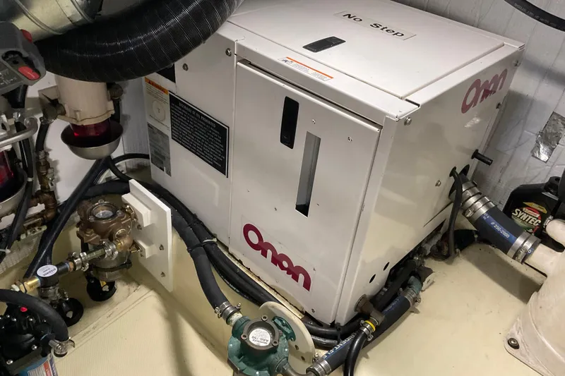 Hot Tuna Yacht Photos Pics Engine room of 2002 American Tug Hull #24 with Onan generator.