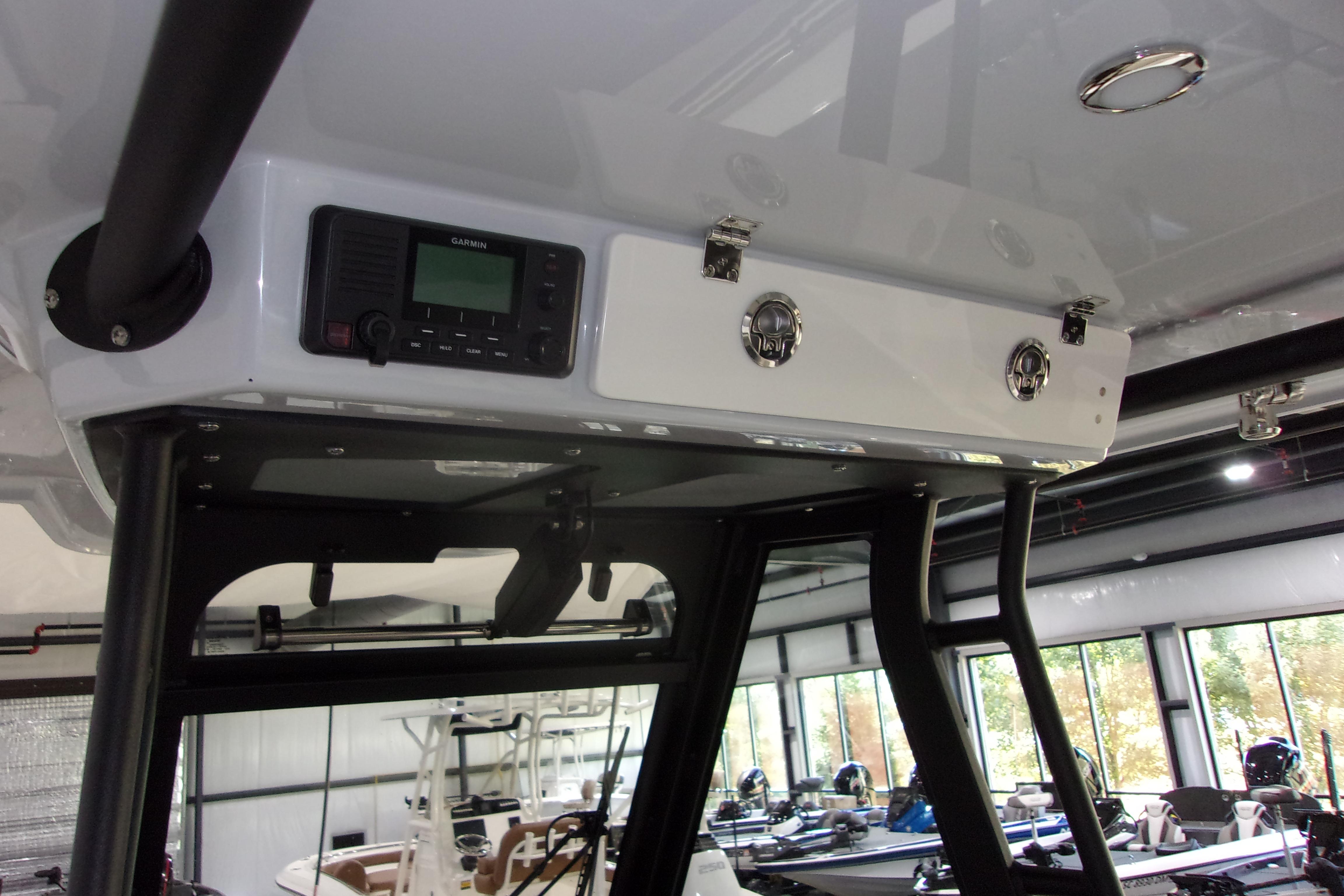 2026 Cobia 305 Center Console boat interior with Garmin electronics.