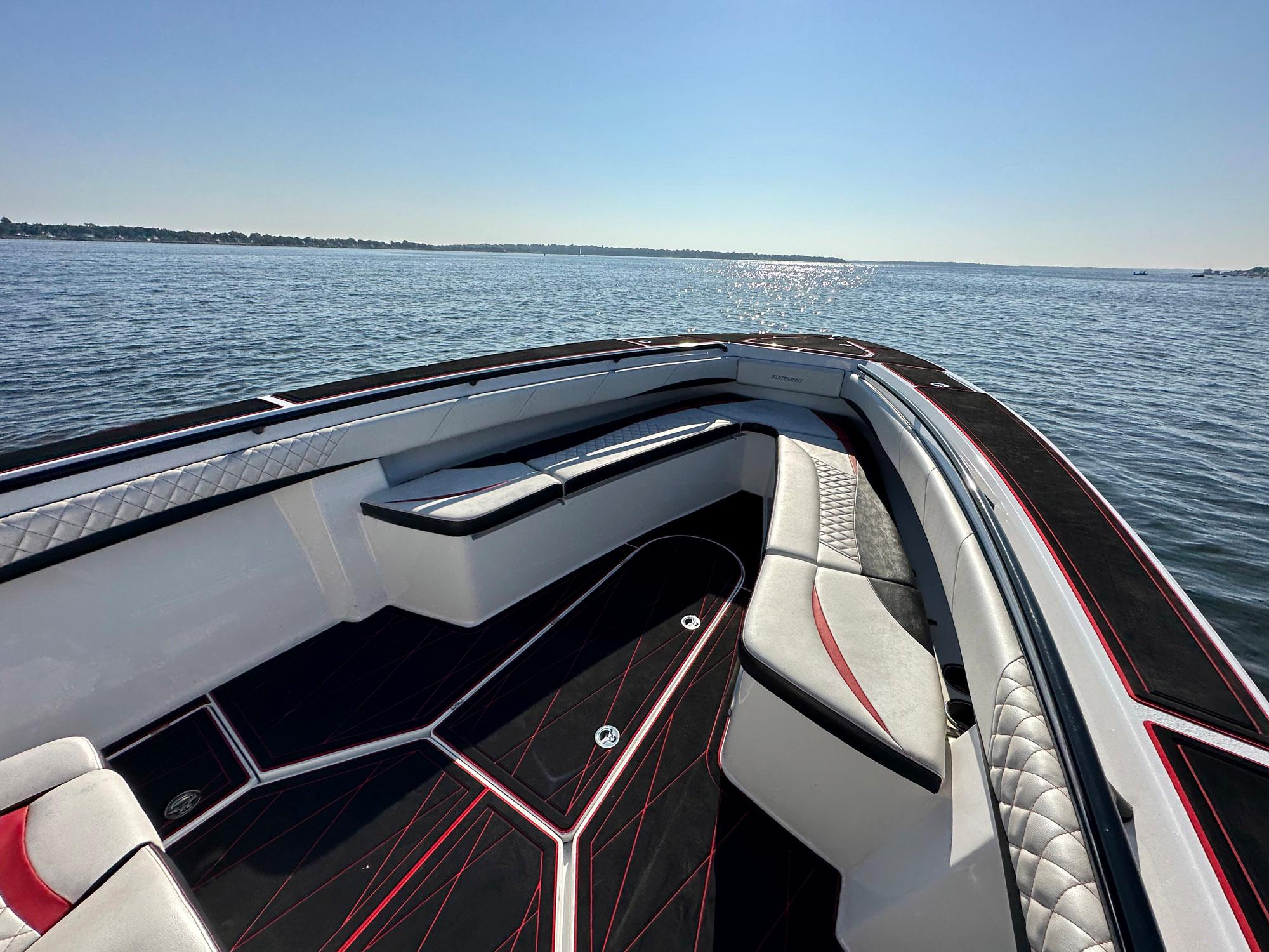 Luxurious 2017 Statement 380 Open boat interior with sleek seating on open water.