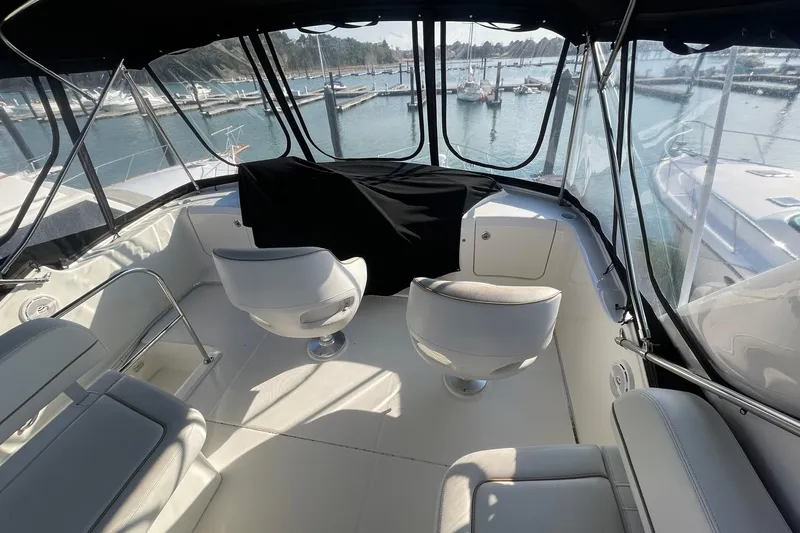 Hobe Yacht Photos Pics FLYBRIDGE HELM DECK FORWARD WITH TWIN CAPTAINS CHAIRS & HELM WEATHER COVER
