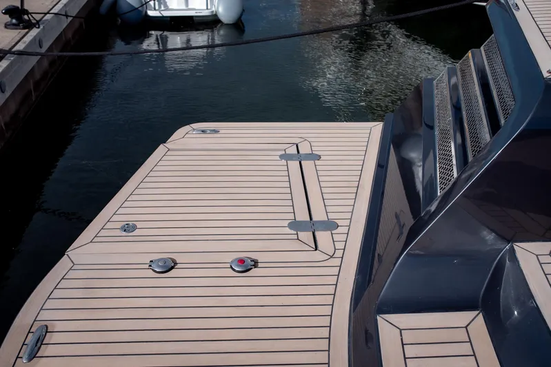 Explorer 1 Yacht Photos Pics Luxury yacht deck of 2024 Ridas 62, featuring sleek wooden finish and modern design elements.