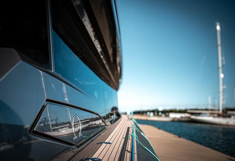 Explorer 1 Yacht Photos Pics 2024 Ridas 62 yacht docked, showcasing sleek design and modern features.